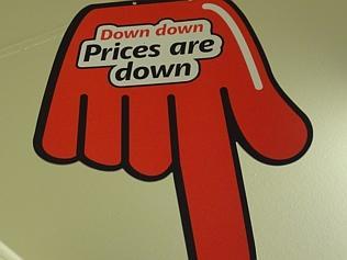  Coles prices are down hand used in their advertisements. Down down prices are down. 