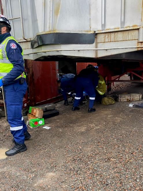 Man being rescued by crews. Supplied.