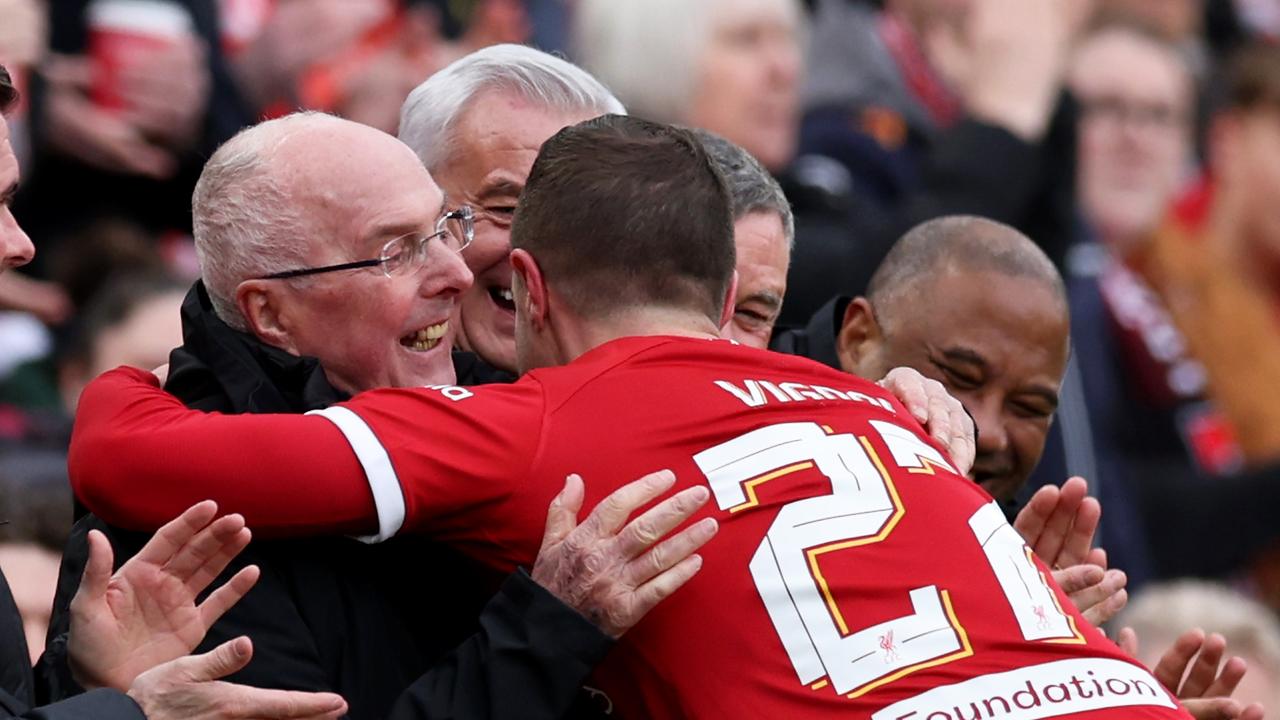 Gregory Vignal celebrates with Eriksson during a Liverpool Legends match in March this year. (Photo by Clive Brunskill/Getty Images)