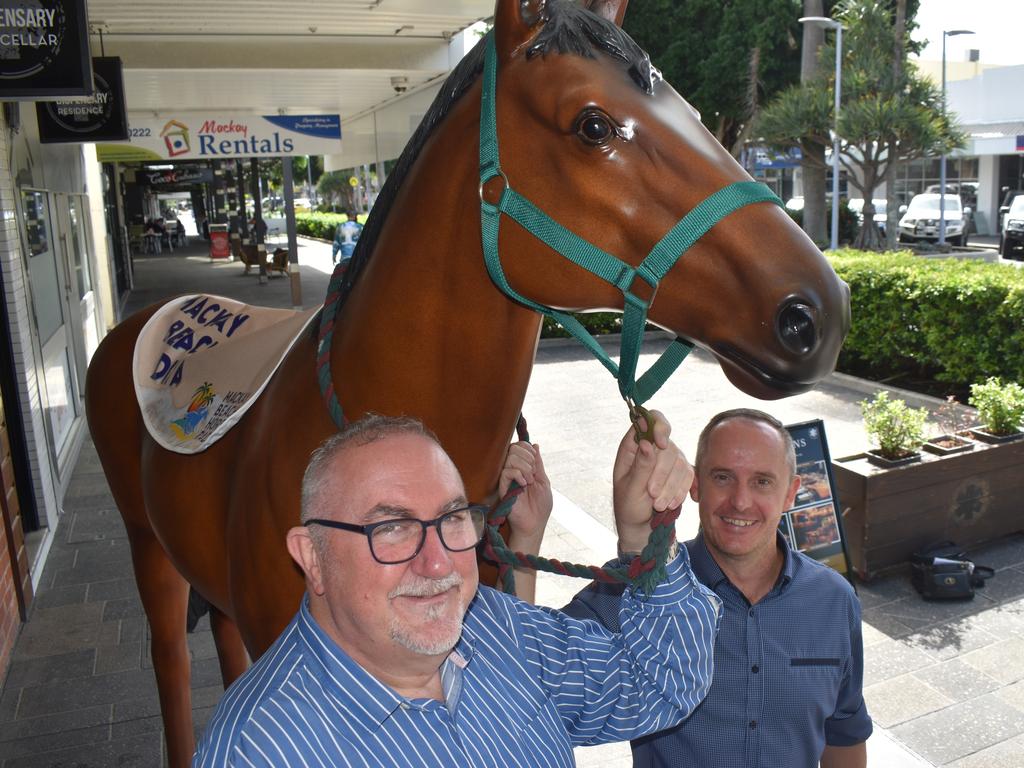 Mackay Beach Horse Races director James Dein and Mackay Tourism CEO Tas Webber at the front of The Dispensary promoting the Mackay Beach Horse Races, April 28, 2022. Picture: Lillian Watkins