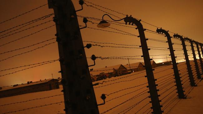 A barbed wire fence surrounds the former Auschwitz-Birkenau concentration camp. Picture: Sean Gallup/Getty Images