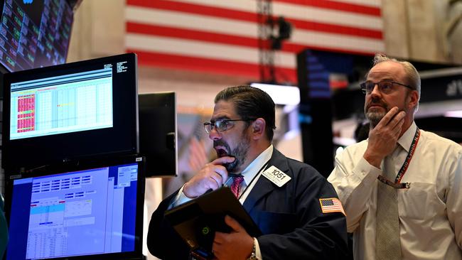 Traders on the floor of the New York Stock exchange in March. Picture: AFP