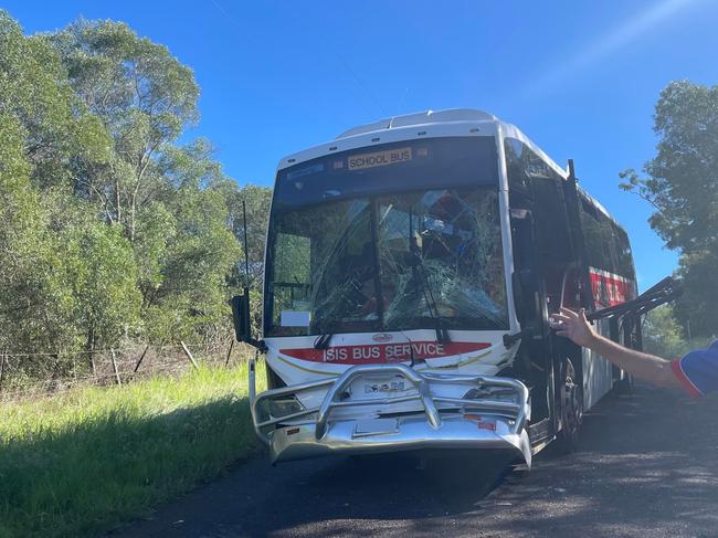 School bus damaged in crash with tractor at South Isis Friday morning, March 31, 2023.