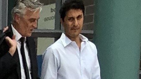 Vahid Khodabandeh with his lawyer. Picture: Tony Ibrahim