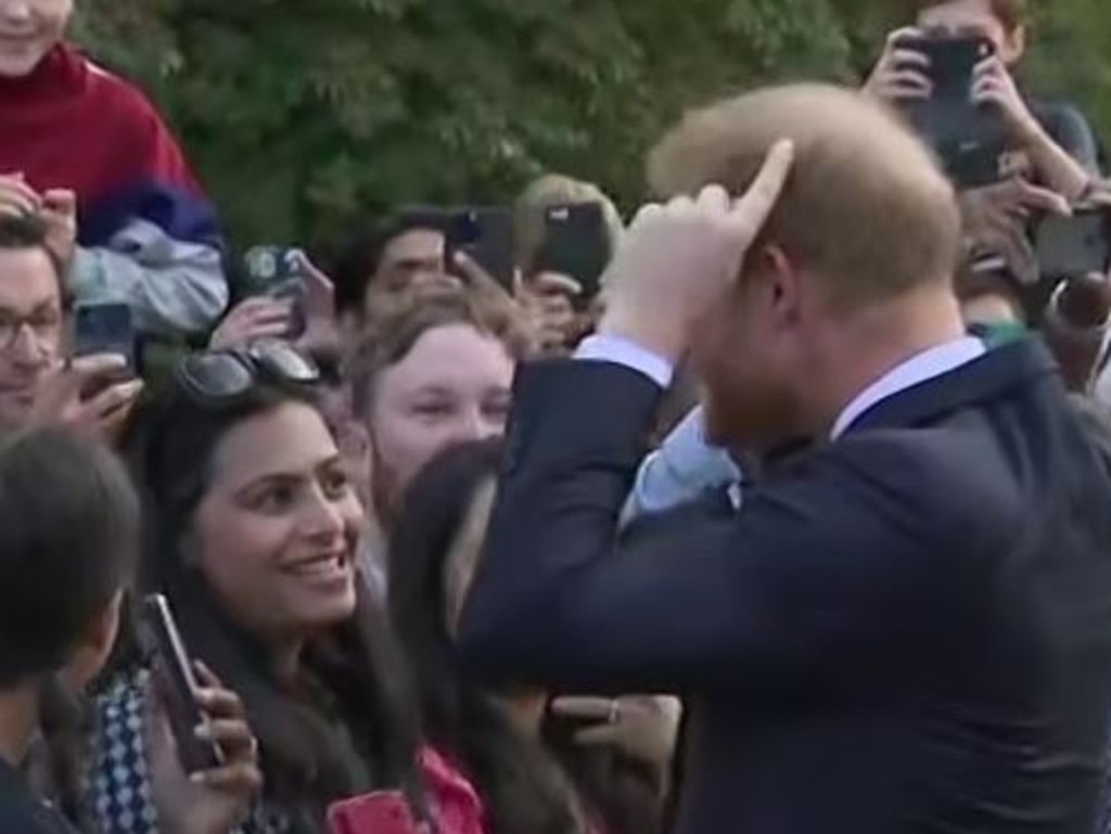 Prince Harry chats with the crowd outside Windsor Castle as he thanked them for their support after the Queen's death. Picture: BBC News