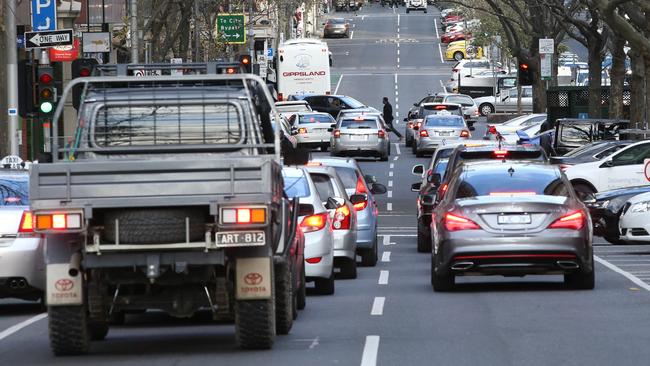 Pedestrians, cyclists and public transport users will get priority under a radical proposal to cut the number of cars coming into the city by 50,000 a day. Picture: David Caird