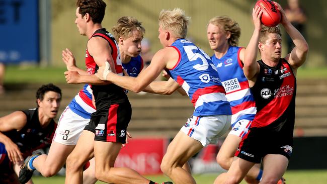 West Adelaide’s Connor Fairlie breaks away from the Central District pack at Richmond Oval on Saturday. Picture: Dean Martin