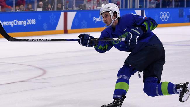 Ziga Jeglic scores the game-winning goal against Slovakia during a penalty-shot shootout in the men's preliminary round ice hockey. Picture: AFP