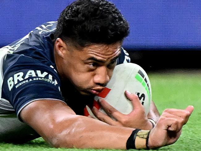 BRISBANE, AUSTRALIA - AUGUST 25: Murray Taulagi of the Cowboys scores a try during the round 26 NRL match between Dolphins and North Queensland Cowboys at Suncorp Stadium on August 25, 2023 in Brisbane, Australia. (Photo by Bradley Kanaris/Getty Images)