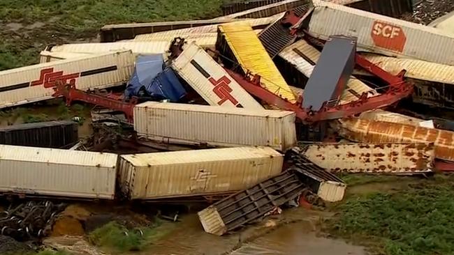 The freight train derailment left carriages scattered across the field. Picture: 9 News