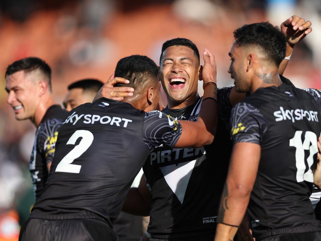 New Zealand celebrate the historic victory. Picture: Phil Walter/Getty Images