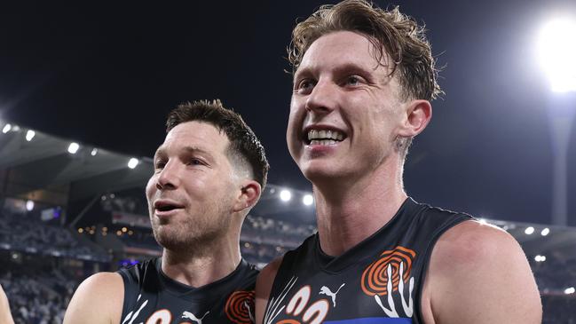 GEELONG, AUSTRALIA - MAY 25: Toby Greene of the Giants celebrates with Lachie Whitfield of the Giants after their win during the 2024 round 11 AFL match between Geelong Cats and Greater Western Sydney Giants at GMHBA Stadium, on May 25, 2024, in Geelong, Australia. (Photo by Martin Keep/AFL Photos/Getty Images)