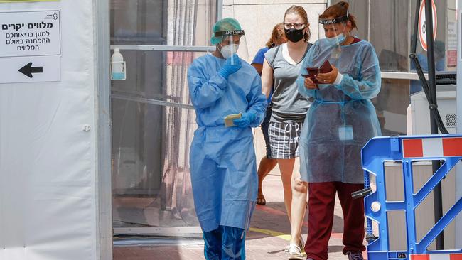 Israeli medical workers in protective gear at the Sheba Medical Centre, the country's largest hospital, near the coastal city of Tel Aviv. Picture: AFP