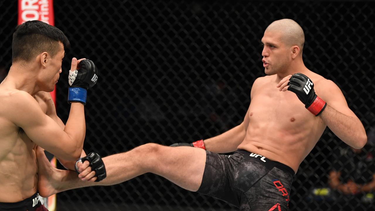 Brian Ortega kicks The Korean Zombie. (Photo by Josh Hedges/Zuffa LLC via Getty Images)