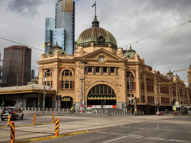 MELBOURNE, AUSTRALIA - NewsWire Photos FEBRUARY 13, 2021: Flinders Street and the Melbourne CBD is deserted as Victoria begins a snap five day lockdown. Picture: NCA NewsWire / Paul Jeffers