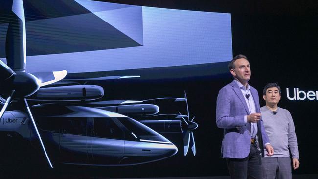 Eric Allison (L), Head of Uber Elevate, and Jaiwon Shin, Head of Urban Air Mobility at Hyundai, at the Hundai news event where Hyundai announced it's partnership with Uber to create an air taxi network in January. Picture: AFP