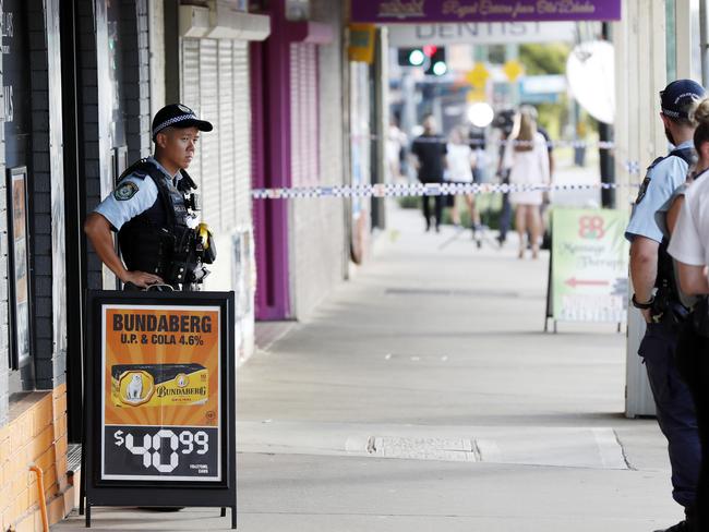 Police on the scene on Railway Parade in Glenfield. Picture: Jonathan Ng