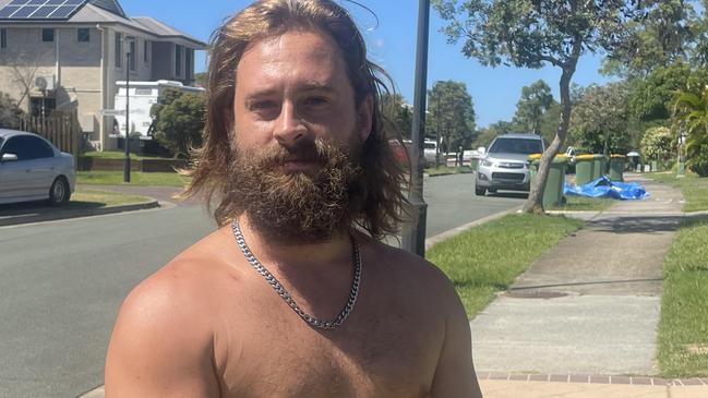 Neighbour Aaron Withers speaking about the house fire and discovery of a man's body at the Coomera home. Picture: Kaitlyn Smith