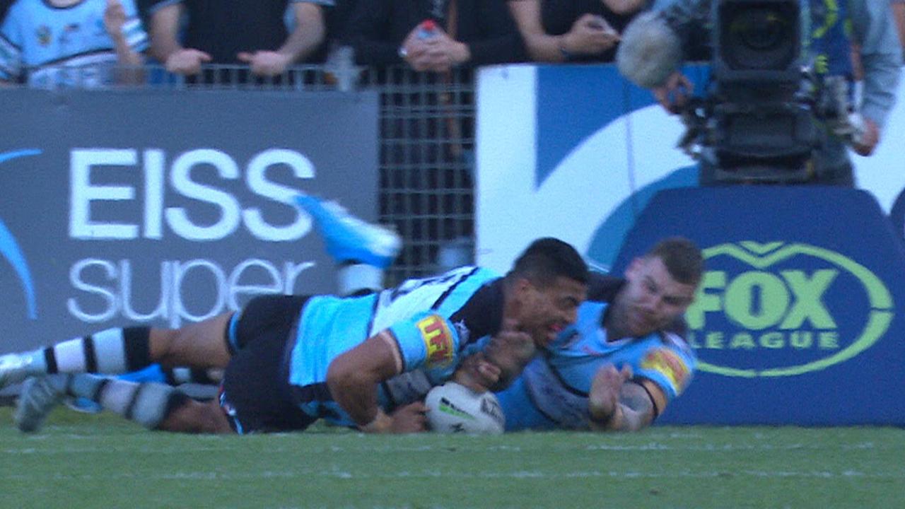 Ronaldo Mulitalo and Josh Dugan fight for the try