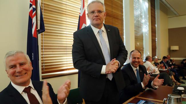 Deputy Prime Minister Mark McCormack with Prime Minister Scott Morrison and Josh Frydenberg. Picture: Gary Ramage