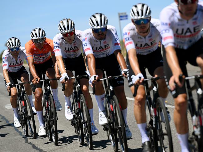 WILLUNGA, AUSTRALIA - JANUARY 20: Isaac Del Toro Romero of Mexico - Orange Santos Leader's Jersey and Finn Fisher-Black of New Zealand and UAE Team Emirates compete during the 24th Santos Tour Down Under 2024, Stage 5 a 129.3km stage from Christies Beach to Willunga Hill 372m on January 20, 2024 in Willunga Hill, Australia. (Photo by Tim de Waele/Getty Images)