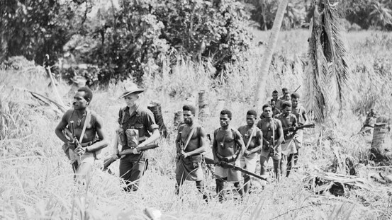 Sergeant J.F. Stone, second from left, leads a section from A Company, 1st Papuan Infantry Battalion in March, 1944, on the Huon Peninsula. Picture: Australian War Memorial