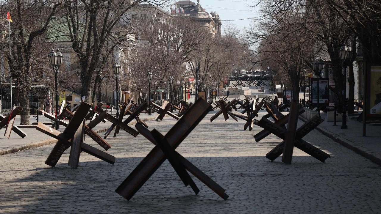 Anti-tank obstacles in downtown Odessa, just 55km form the Moldova border. (Photo by Oleksandr GIMANOV / AFP)