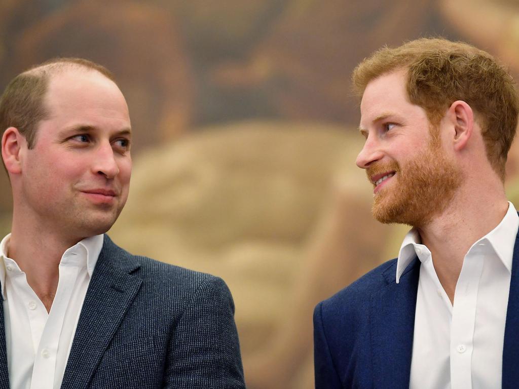 Britain's Prince Harry (R) and Britain's Prince William, Duke of Cambridge.