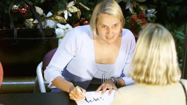 ‘Madame Butterfly’ Susie O'Neill signs copies of her book at Westfield Parramatta on November 23, 2000, two months after winning gold in the 200m freestyle at Sydney Olympics. Picture: Noel Kessel