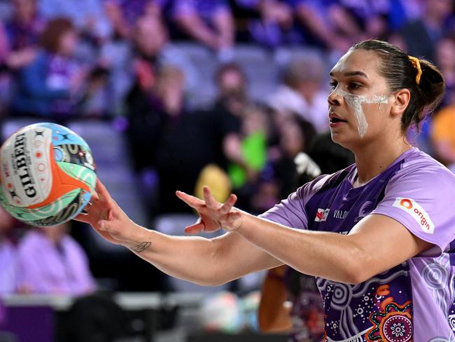 BRISBANE, AUSTRALIA - JULY 06: Donnell Wallam of the Firebirds passes the ball during the warm up before the round 13 Super Netball match between Queensland Firebirds and Sunshine Coast Lightning at Nissan Arena, on July 06, 2024, in Brisbane, Australia. (Photo by Bradley Kanaris/Getty Images)