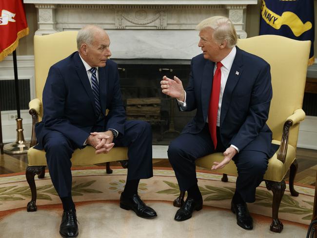 President Donald Trump sits down with new White House Chief of Staff John Kelly who he predicts will be one of the “greatest” in the role. Picture: AP Photo/Evan Vucci.