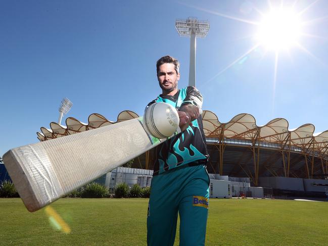 Heat star Ben Cutting outside Metricon Stadium. Picture: Richard Gosling