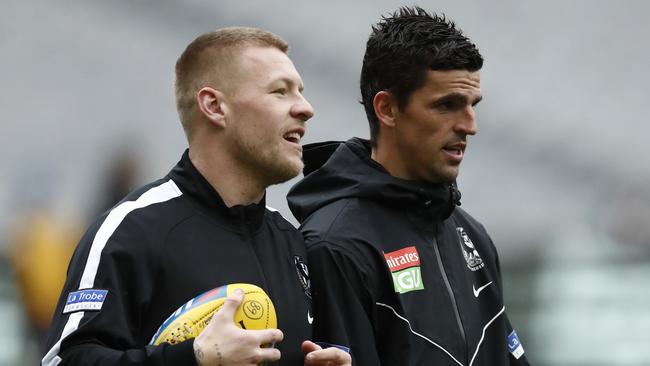 Jordan De Goey, left, is back in the Collingwood midfield alongside Scott Pendlebury. Picture: by Darrian Traynor/Getty Images