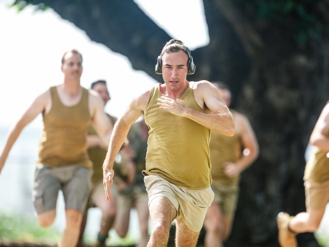 The defence of Darwin is reenacted during the 77th Anniversary of the Bombing of Darwin special commemorative service in Darwin, Tuesday, February 19, 2019. (AAP Image/GLENN CAMPBELL)