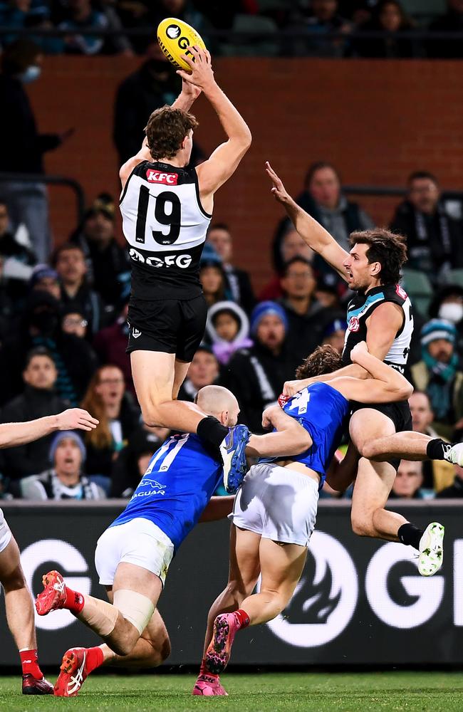 Mitch Georgiades soared to take a massive hanger. Picture: Getty Images