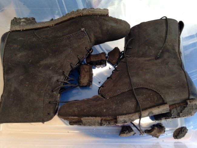 A pair of boots with melted soles that a Mr. Orazem wore while working at the World Trade Center after the terrorist attacks of 2001. Mr. Orazem was a New York City police detective when the towers were destroyed. Picture: Carol Orazem