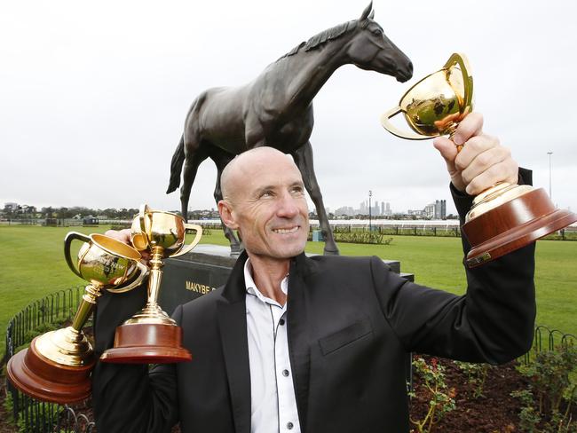 Jockey Glen Boss at Flemington next to the Makybe Diva statue. Picture: David Caird