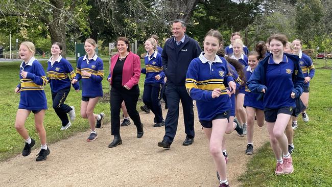 Ballarat mayor Daniel Moloney and Member for Wendouree Juliana Addison with Loreto College students to mark the commencement of the Lake Wendouree lighting project.