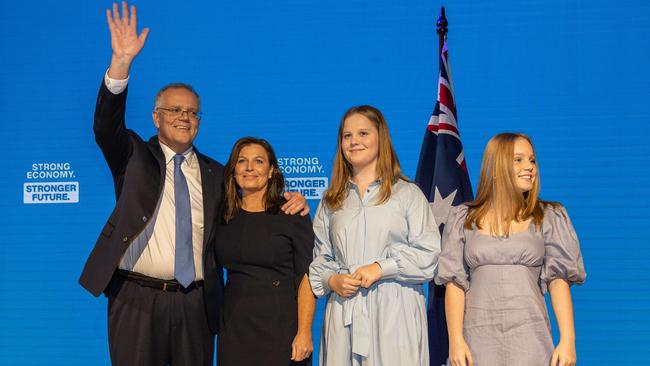 Scott Morrison with his fire Jenny and daughters Abbey and Lily. Picture: Jason Edwards