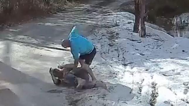 Still images from a road rage attack at Nerang. 