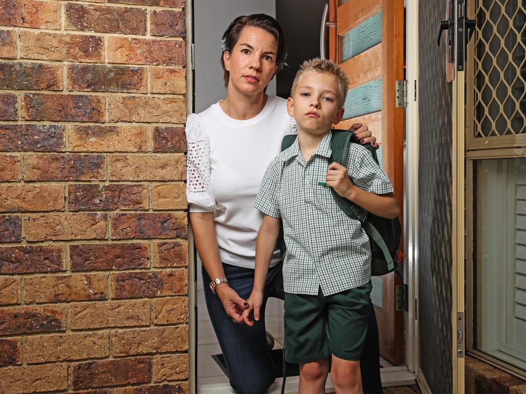 Kristy Frappell alongside seven-year-old son Lachlan Frappell who are waiting to find out when school will return Picture: Zak Simmonds