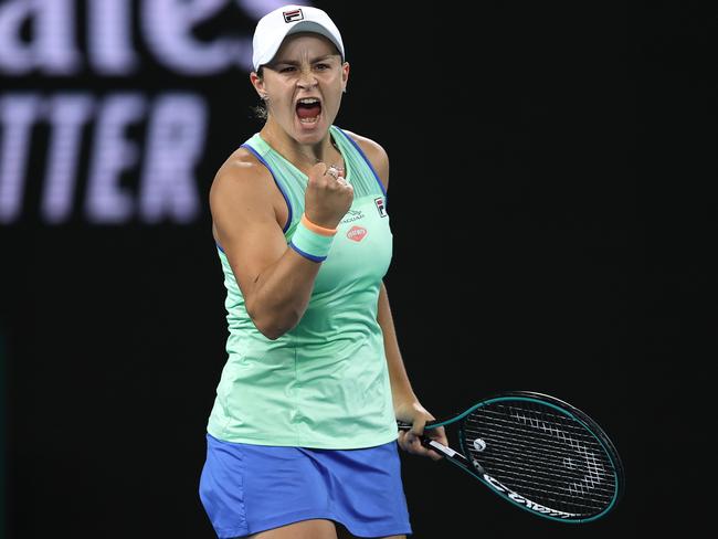 MELBOURNE, AUSTRALIA - JANUARY 26: Ashleigh Barty of Australia celebrates after winning match point during her Women's Singles fourth round match against Alison Riske of the United States on day seven of the 2020 Australian Open at Melbourne Park on January 26, 2020 in Melbourne, Australia. (Photo by Clive Brunskill/Getty Images)