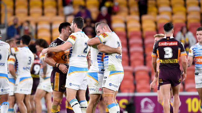 Keegan Hipgrave and Mitch Rein of the Titans celebrate victory. Picture: Bradley Kanaris/Getty Images