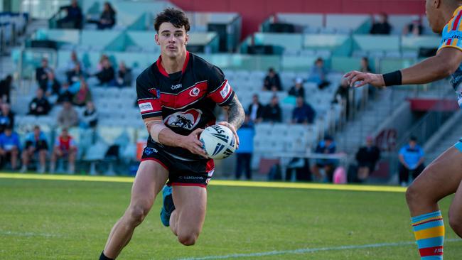 Collegians Vs De Le Salle. Callum Gromek running the ball. Picture: Thomas Lisson