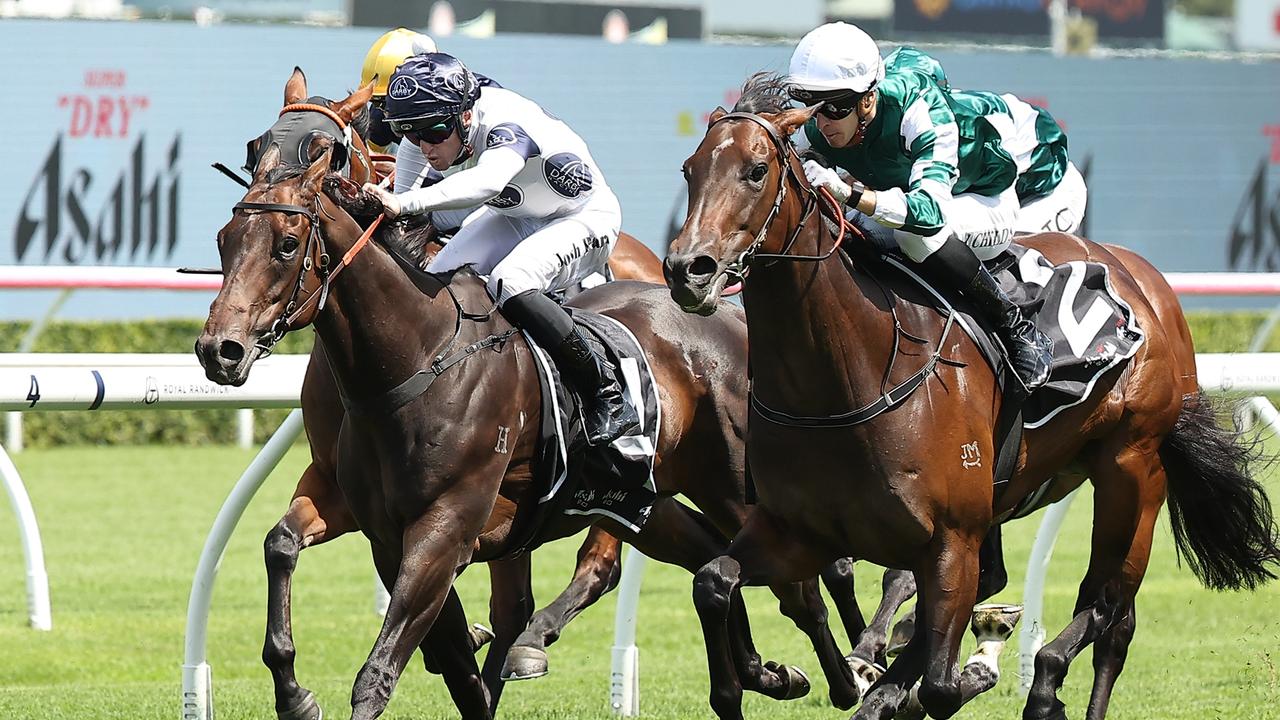 Magic Time and Jordan Childs (right) charge home to beat Iowna Merc (left) to win the Group 2 Expressway Stakes at Royal Randwick. Picture: Getty Images