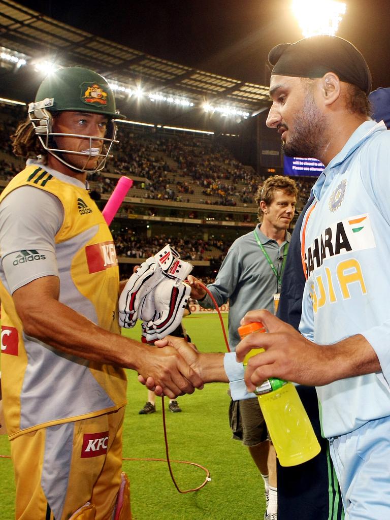 Symonds shakes hands with Harbhajan Singh after a Twenty20 match at the MCG in 2008.