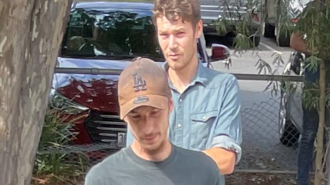 Jaison Allen Knight (front) and Jacob Colin Woodhouse (back) were sentenced in Chinchilla Magistrates Court after they were caught looting the Train residence following the Wieambilla massacre.