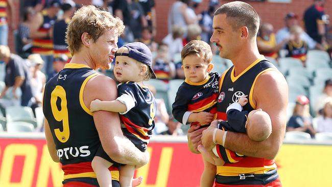 Taylor Walker and Rory Sloane before playing Geelong in 2021. Picture: Sarah Reed/AFL Photos via Getty Images