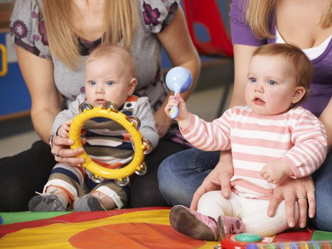 Learning and having fun photo from istock. Baby music classes.