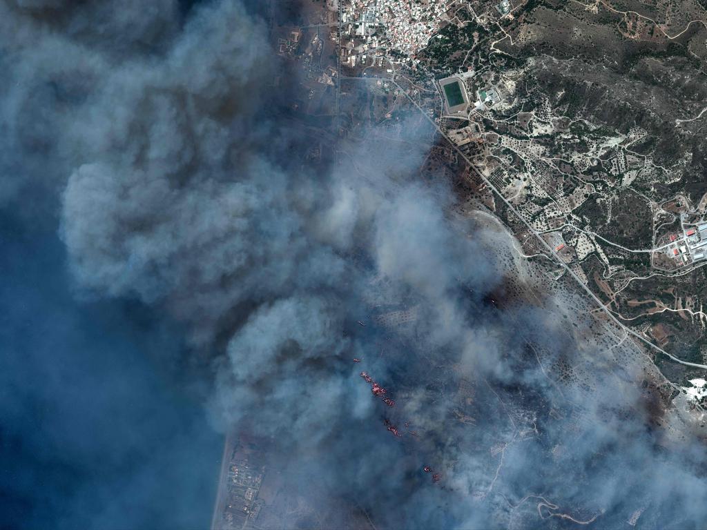 This satellite image shows a view of a fire near Gennadi on Rhodes island in Greece. Tens of thousands of people have already fled. Picture: AFP